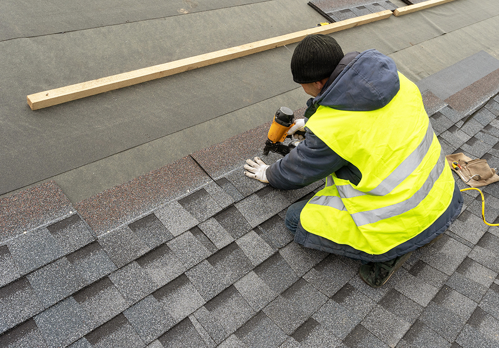 Sevastopol, WI roofing contractor replacing asphalt roof shingles