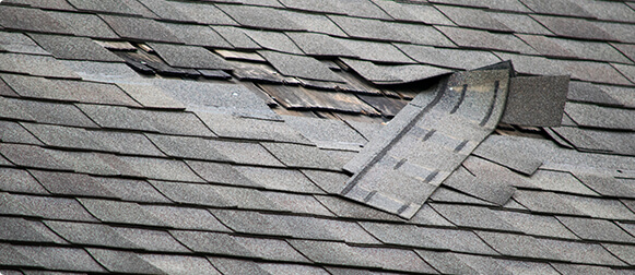 damaged shingle roof repair