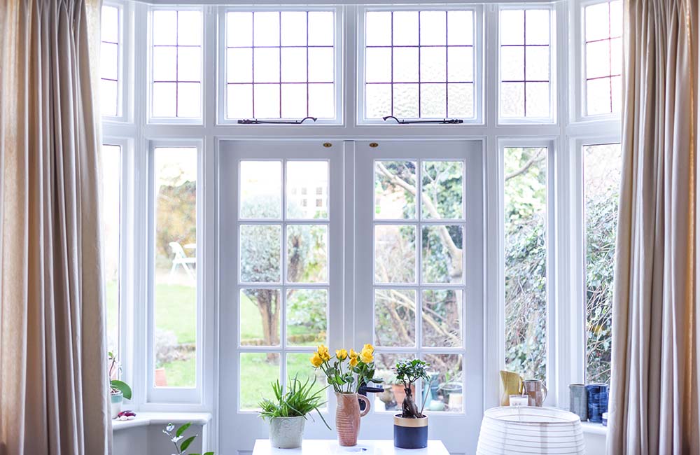 Vinyl custom replacement windows installed by Overhead Solutions