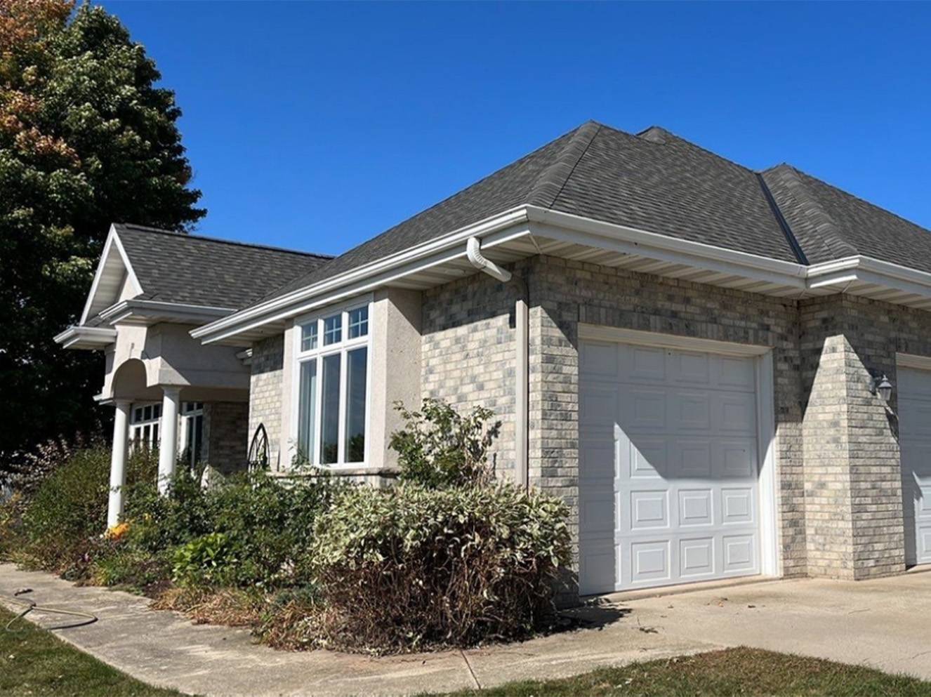 roofing costs in little chute wi