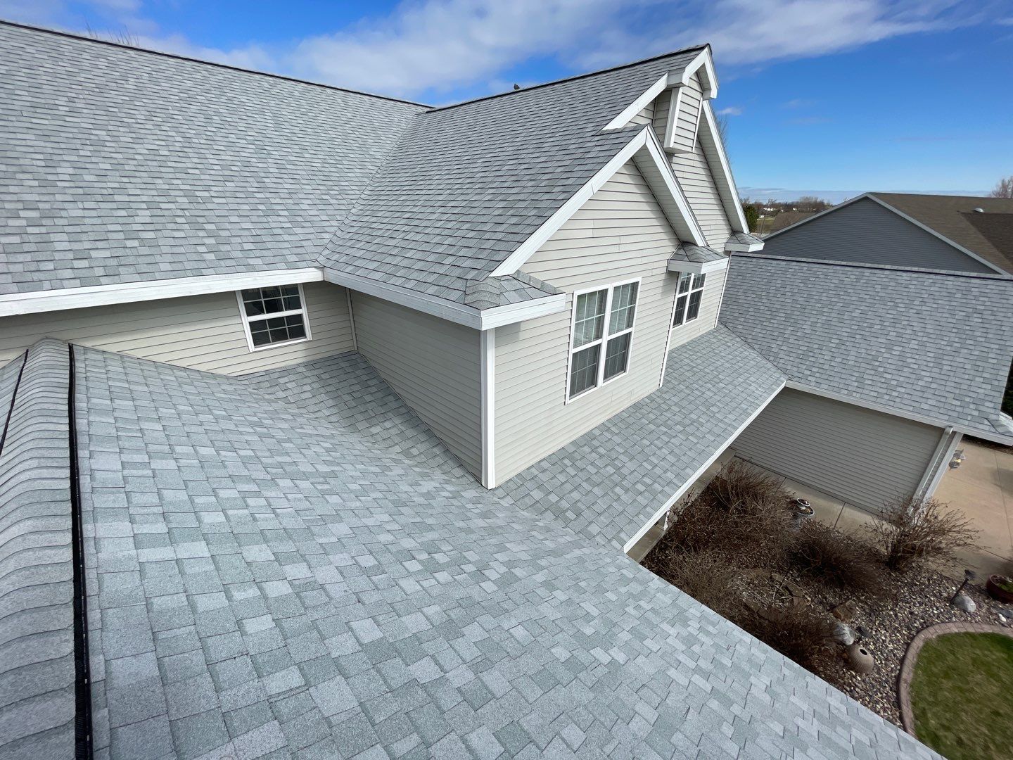 Grey Asphalt Shingles Installed on a Green Bay Home in Wisconsin