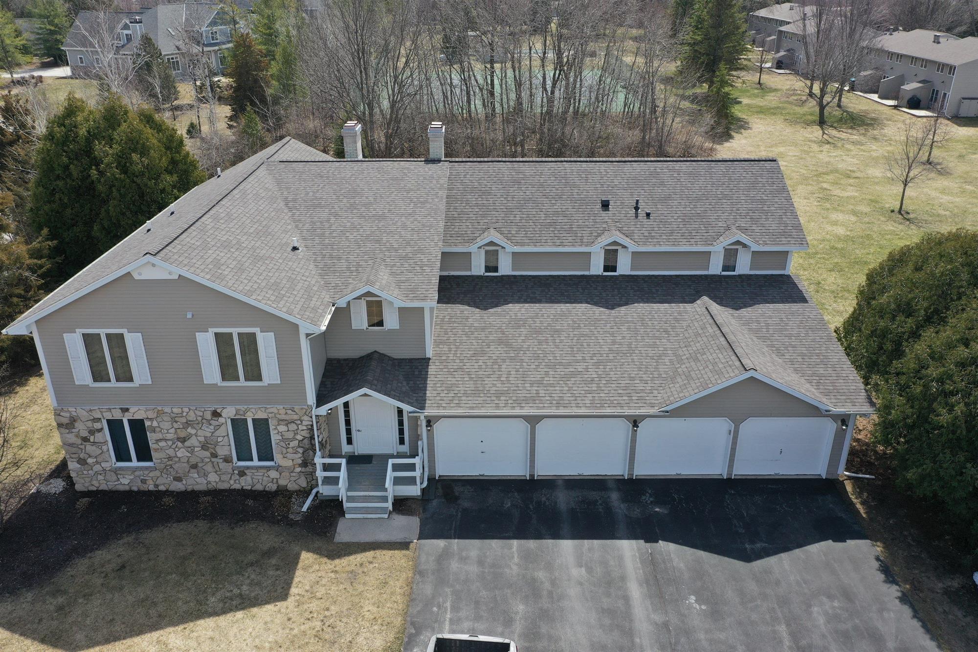 Light Grey Shingles on a roof of a home in Green Bay, WI