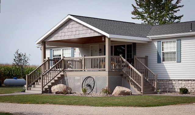 Single-Story home with new asphalt shingles from Overhead Solutions in Green Bay, WI