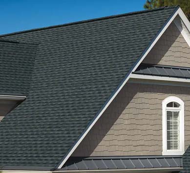 Installation of  Charcoal Shingles on house