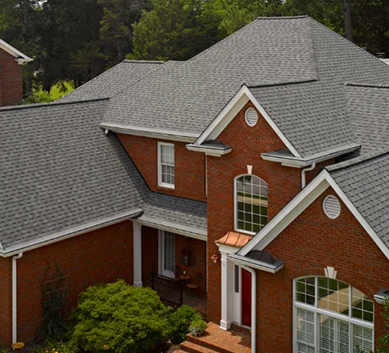 Installation of Colonial Slate Shingles on house