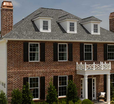 Installation of  Georgetown Gray Shingles on house