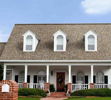 Installation of  Golden Amber Shingles on house