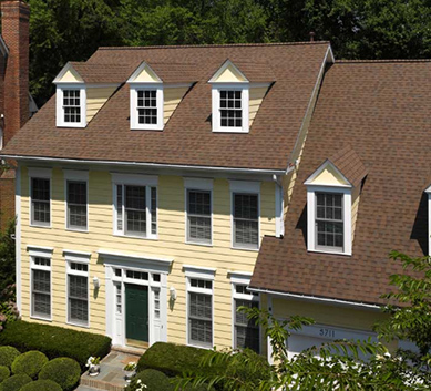 Installation of  Heather Blend Shingles on house