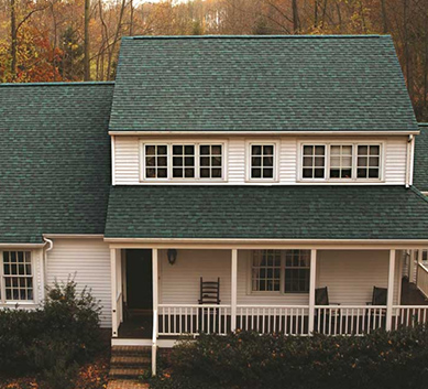 Installation of  Hunter Green  Shingles on house