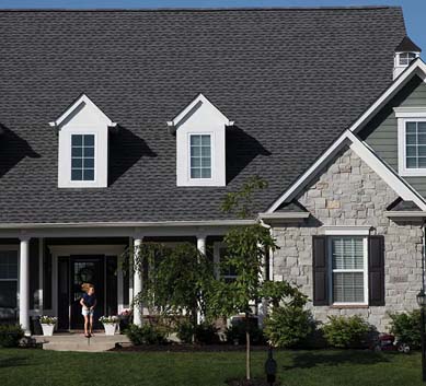 Installation of  Pewter Gray Shingles on house