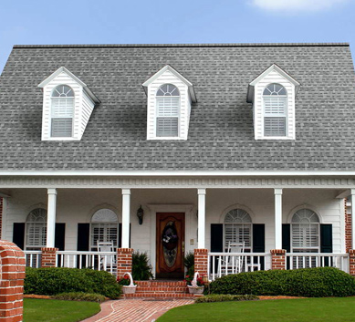 Installation of  Sierra Gray Shingles on house