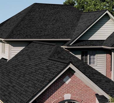 Installation of  Twilight Black Shingles on house