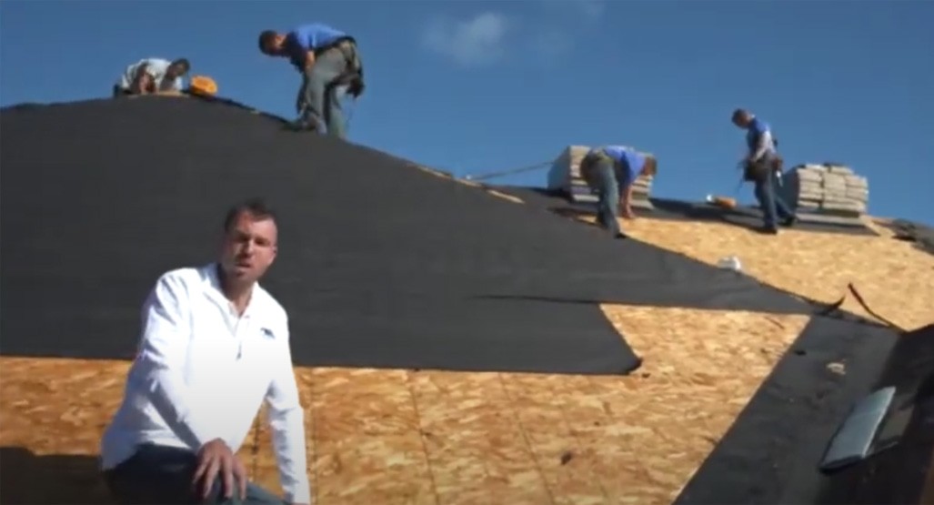 our team of roofers working on a roof installation in green bay
