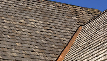 Cedar shake or composite roofing is a classic look, durable, and long-lasting