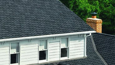 Designer asphalt shingles allow for unique looks and greater durability and color options