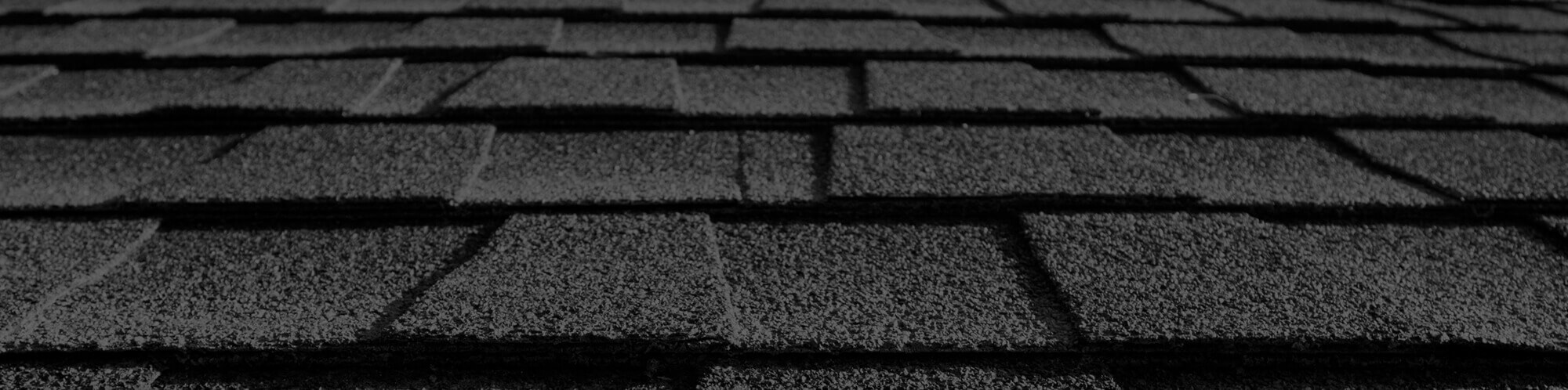 Roofing contractors repair asphalt shingles